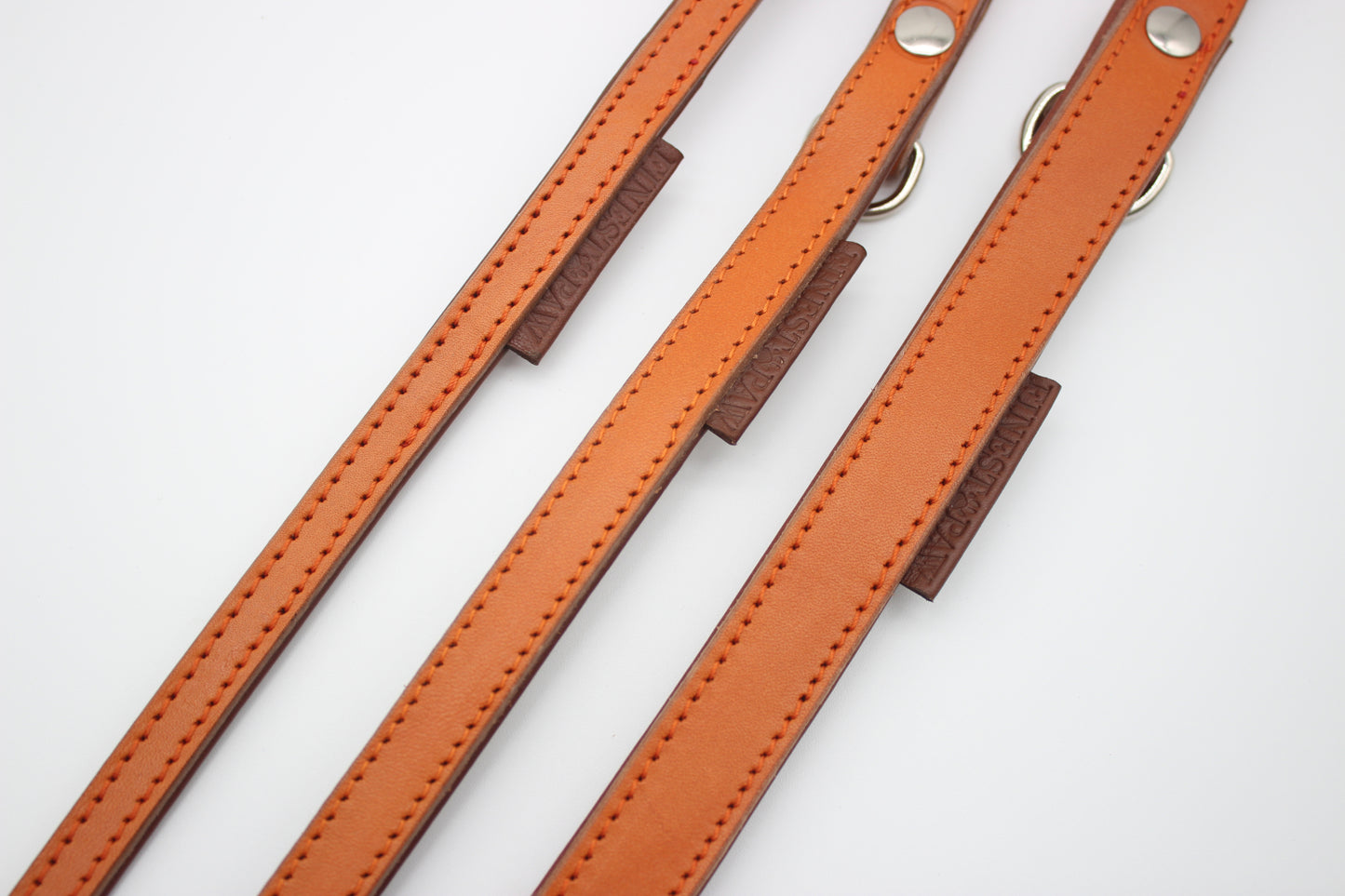 FinestPaw_Leine_Klassik_Premium_Fuehrleine_orange_all_all_silber_3logos